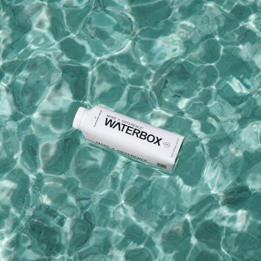 Waterbox Carton in a Pool of Sunlit Water